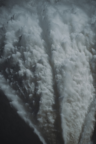 Close up detail of Water flowing from the Hume Dam wall into the Murray River. - Australian Stock Image