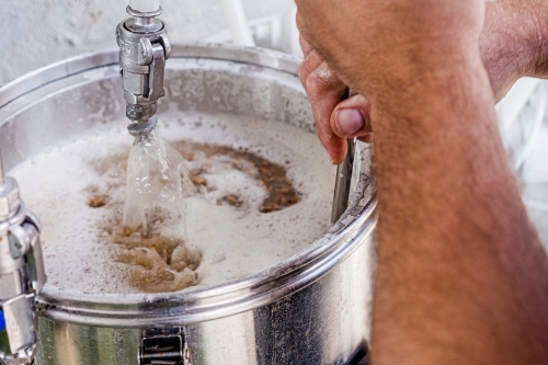 Close-up of a beer mashing procedure. - Australian Stock Image