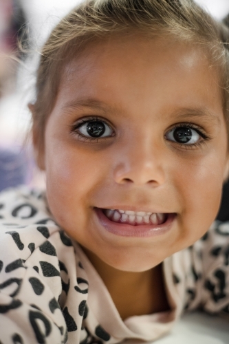 Close-up of a young Aboriginal girl child’s face - Australian Stock Image