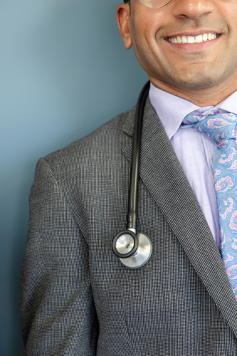Close-up of doctor with stethoscope around neck - Australian Stock Image