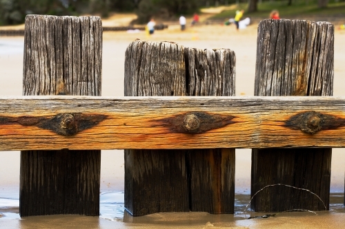 Close up of groyne at sheltered beach - Australian Stock Image