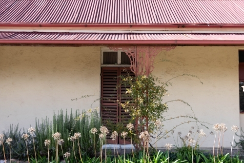 close up of heritage house window with shutters - Australian Stock Image