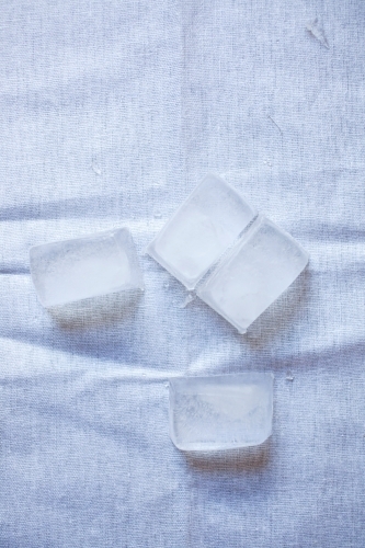 close up of ice on a table cloth - Australian Stock Image