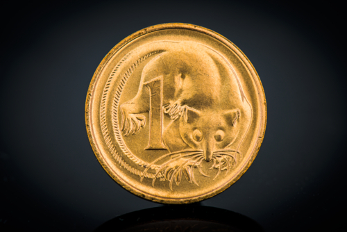 Close-up of one cent coin featuring feathertail glider design - Australian Stock Image
