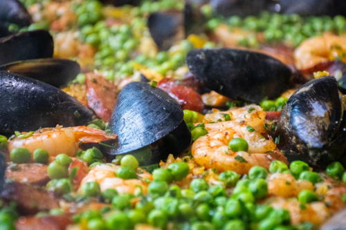 Close up of Paella with mussels and peas - Australian Stock Image
