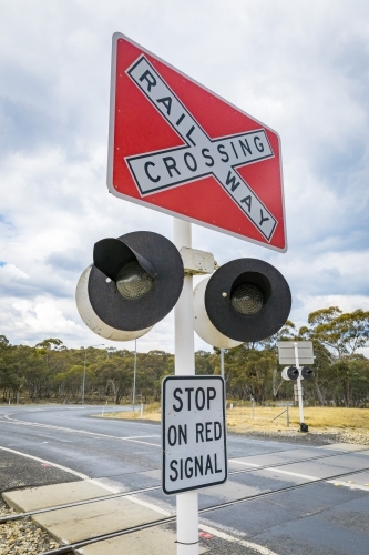 Close up of railway crossing sign