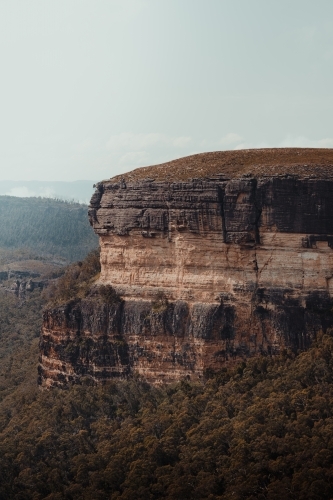 Close up of rocky cliff face view from Kanangra Walls Lookout on a sunny day - Australian Stock Image