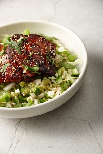 Close up of seared eggplant with brown rice salad dish - Australian Stock Image
