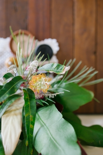 Close up shot of a flower arrangement and plant leaves