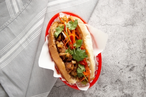 close up shot of a lemon grass chicken roll - Australian Stock Image