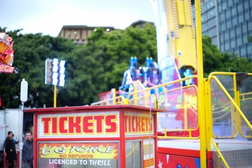 Close-up shot of a ticket booth at the carnival during daytime - Australian Stock Image