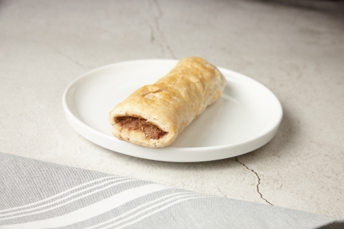 close up shot of sausage roll - Australian Stock Image