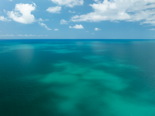 Clouds over blue ocean landscape - Australian Stock Image
