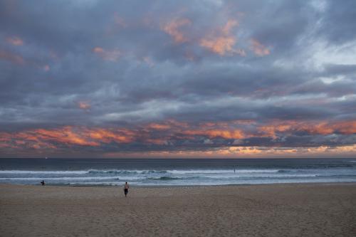 Clouds over Bondi Beach at sunset - Australian Stock Image