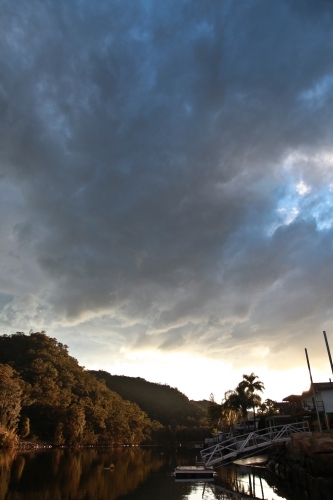 Clouds over river - Australian Stock Image