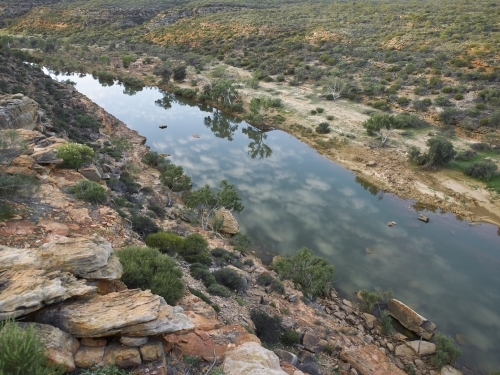 Clouds reflected in river at Kalbarri National Park - Australian Stock Image
