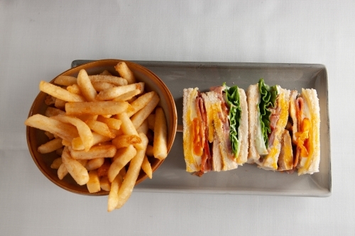 Club sandwiches and fries - Australian Stock Image