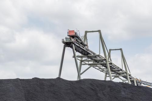 Coal mine conveyor transporting material to a stockpile in NSW Australia. - Australian Stock Image