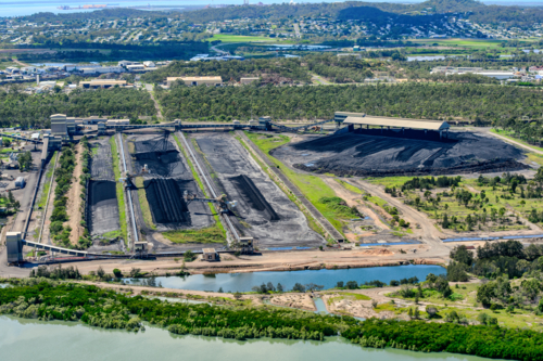 Coal fired power station piles near Gladstone - Australian Stock Image