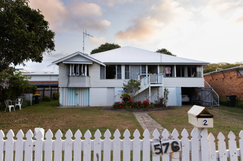 coastal beach house on a big block in the afternoon light - Australian Stock Image