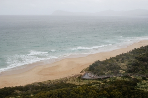 Coastal boardwalk in mountain area - Australian Stock Image