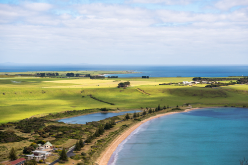 Coastline with beaches and grassy fields - Australian Stock Image