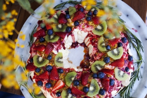 Colourful Christmas pavlova from above - Australian Stock Image