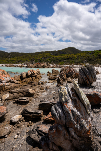Colourful rocks and shore of the Rocky Cape National Park - Australian Stock Image