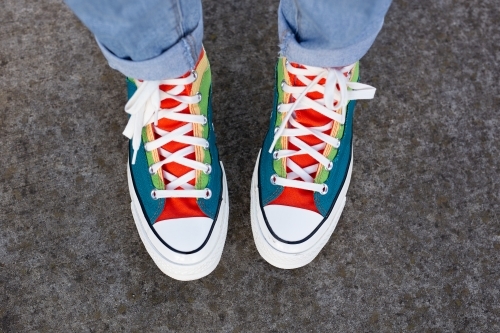 Colourful shoes on footpath - Australian Stock Image