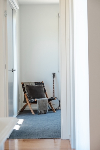 Comfortable chair with banjo. - Australian Stock Image