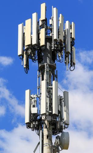 Close up video of a communications tower set against a clear blue sky in NSW Australia, highlighting - Australian Stock Image