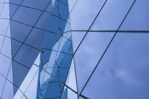 Complex Glass Facade with Reflections of the Sky