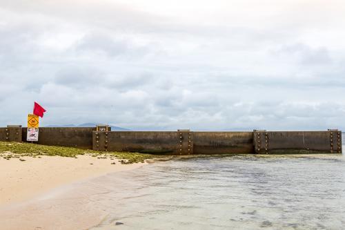 Concrete Breakwall on Beach - Australian Stock Image