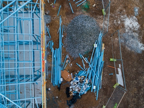 Concrete slab & metal framework of residential house under construction - Australian Stock Image
