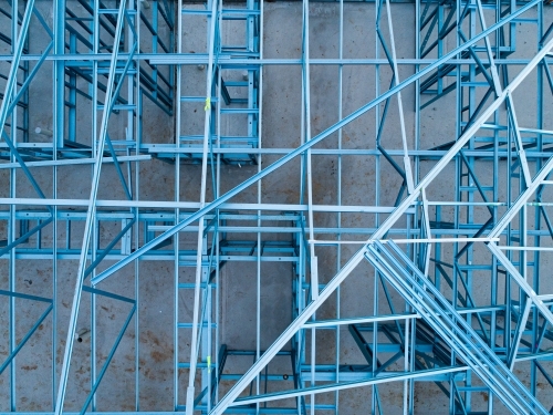 Concrete slab & metal framework of residential house under construction - Australian Stock Image