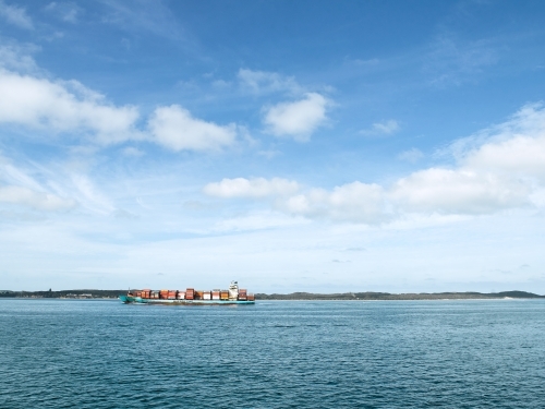 Container ship passing through the heads - Australian Stock Image