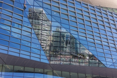 Contemporary modern style architecture with reflection of Sydney cityscape - Australian Stock Image
