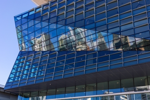 Contemporary modern style architecture with Sydney cityscape in the reflection - Australian Stock Image