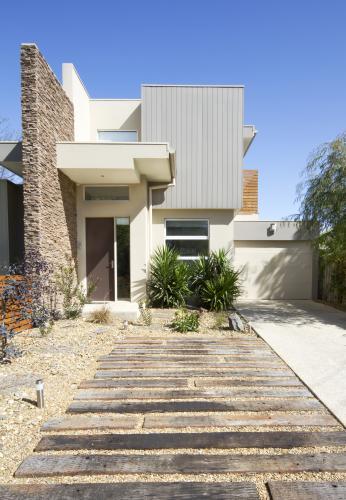 Contemporary townhouse home facade and driveway