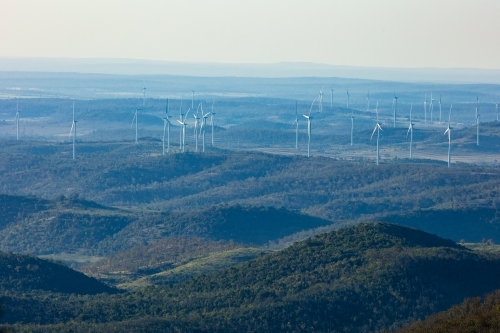 Coopers Gap wind farm in southern Queensland viewed from the distant Bunya Mountains - Australian Stock Image