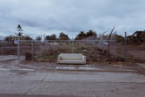 Couch dumped beside a road