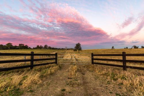 Country Farm Gates with colourful sky - Australian Stock Image