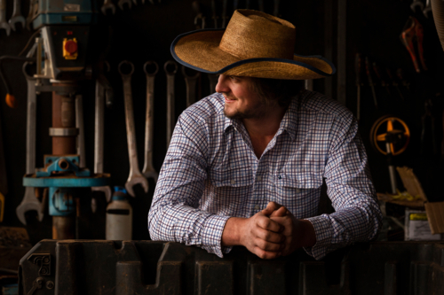 Country farmer in his shed - Australian Stock Image