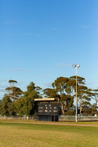 country football oval with scoreboard - Australian Stock Image