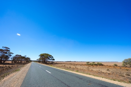 Country road and farm land - Australian Stock Image