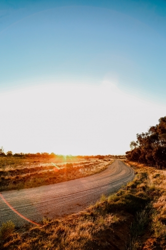 Country road in Central Victoria at sunset - Australian Stock Image