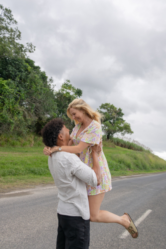 Couple in love hugging on the road - Australian Stock Image