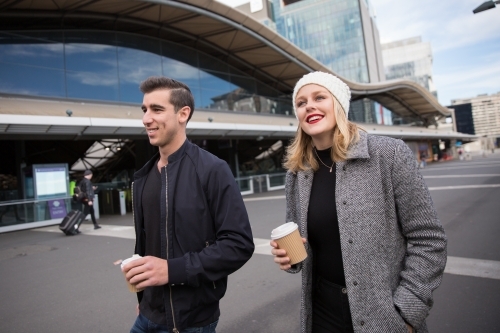 Couple Walking Past Southern Cross Station - Australian Stock Image