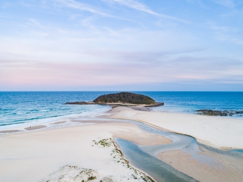 Crampton Island and the outlet of Tabourie creek at dusk - Australian Stock Image