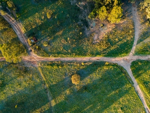 Criss crossing 4WD car tracks through paddock - Australian Stock Image